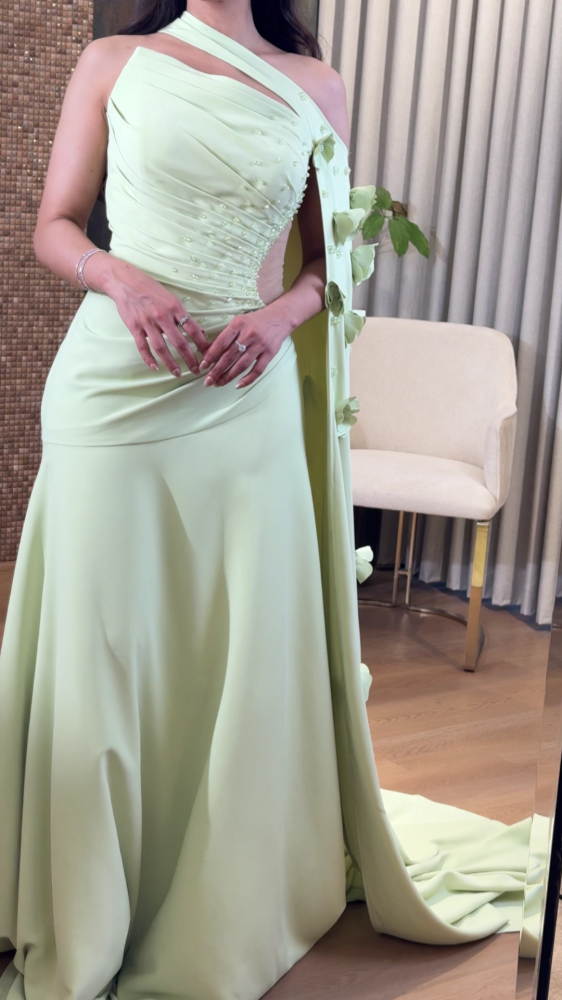 Apple evening dress with a shoulder flap