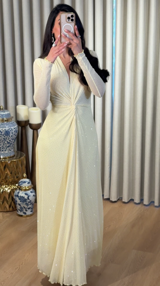 Soft yellow tulle dress with scattered crystals