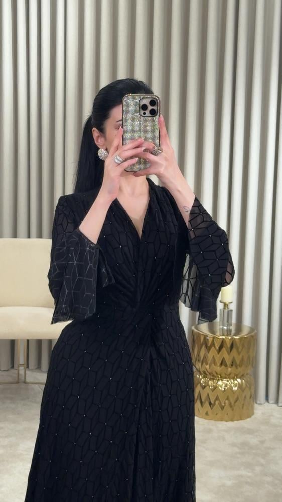 Black dress with luxurious geometric patterns