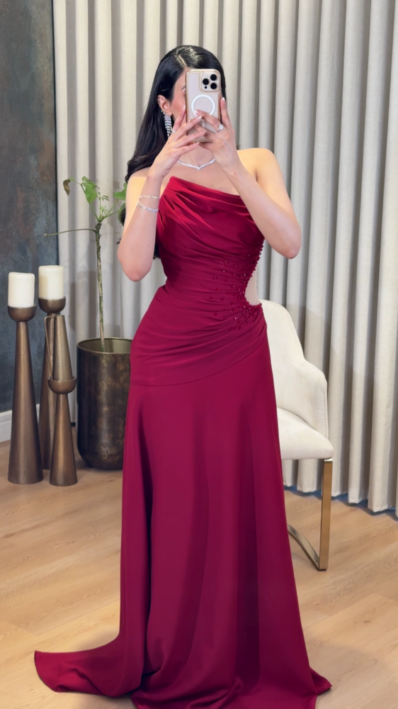 Red evening dress with a shoulder strap