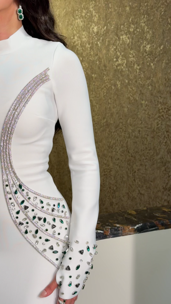Royal white evening dress studded with crystals