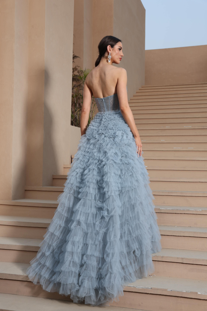 A luxurious evening dress in a calm sky color