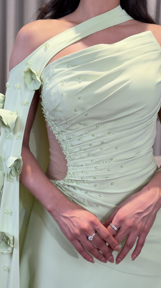 Apple evening dress with a shoulder flap